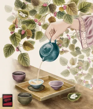 Hand pouring tea with blue teapot and mulberry leaves by Debora Islas