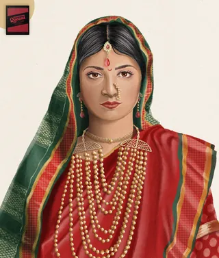 Portrait of a traditional Indian bride wearing jewelry and a saree by Debora Islas