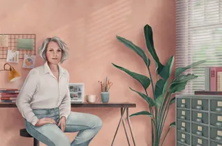 Woman sitting in home office with plants and shelves by Debora Islas