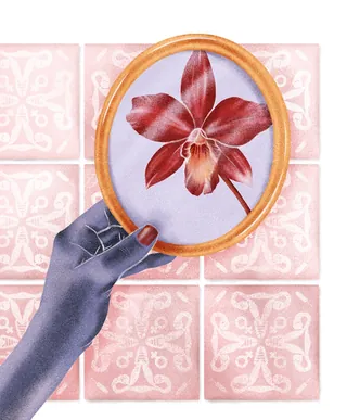 Hand holding oval frame with red orchid flower by Debora Islas