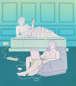 Classical statues in modern setting using laptop and smartphone