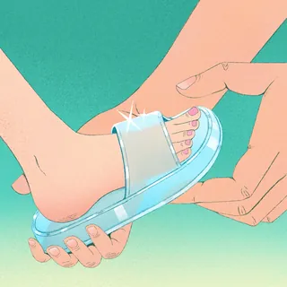 Person putting a sparkling sandal on another person's foot