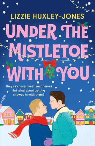 Two people standing under mistletoe with festive lights and houses
