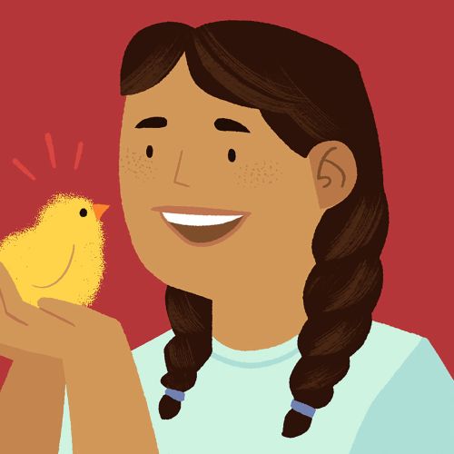 Girl smiling and holding a yellow baby chick in her hands by Drew Bardana