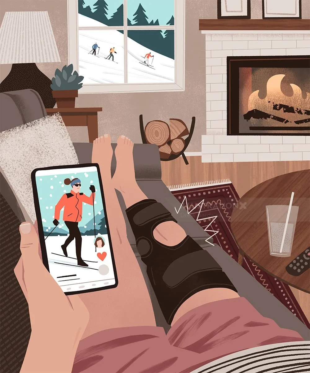 Person with knee brace on couch watching ski video by fireplace