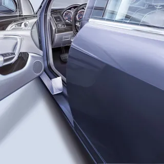 Interior view of a car with open door, showing dashboard and door panel by Eberhard Reimann
