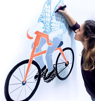 Dibujo de evento en vivo de un hombre en bicicleta.
