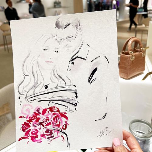 Couple drawing at Dior live event