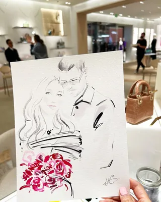 Couple drawing at Dior live event