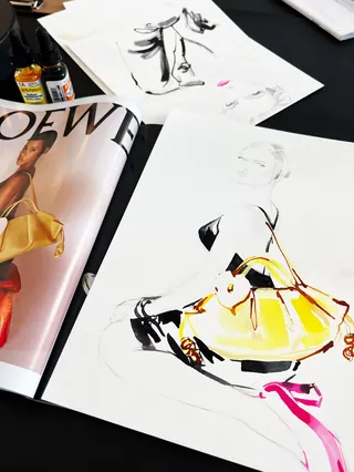 Fashion sketch of model with yellow bag by Elise Lee Live Event Drawing