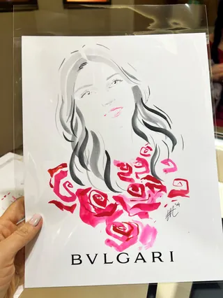 Illustration of a woman with roses around her neck at Bvlgari event