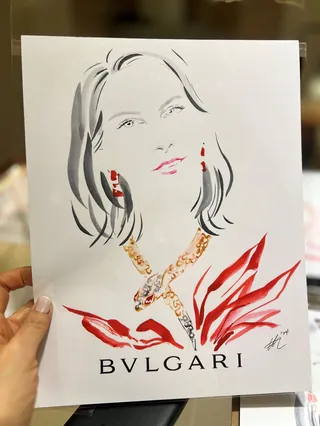 Illustration of a woman wearing Bvlgari jewelry with red accents
