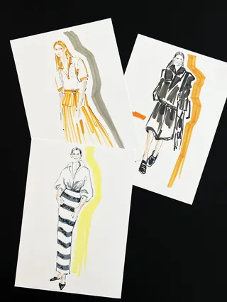 Three fashion sketches of models in stylish outfits with colorful accents