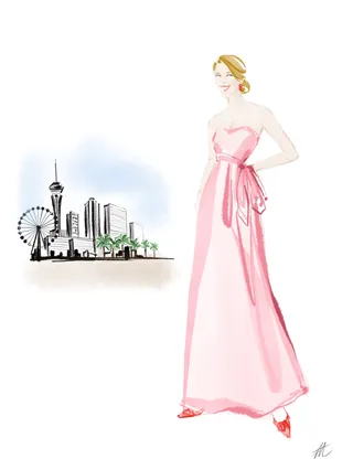 Woman in pink gown with Las Vegas skyline background