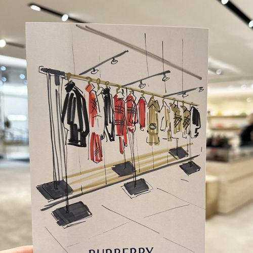 Live Burberry clothing rack illustration by Elise Lee