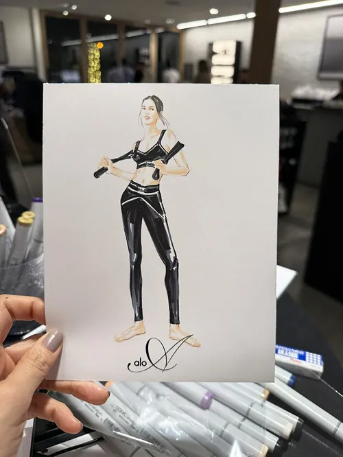 Fashion illustration of a woman in black outfit by Elise Lee