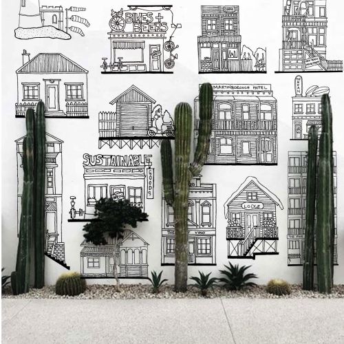 Wall mural with various architectural sketches and cacti by Ellie Compton