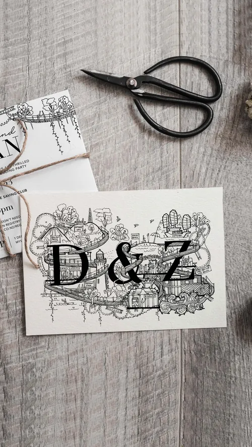 Wedding invitation card with D and Z initials and floral decorations