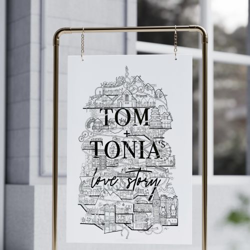 Black and white line art with text on hanging stand in modern interior