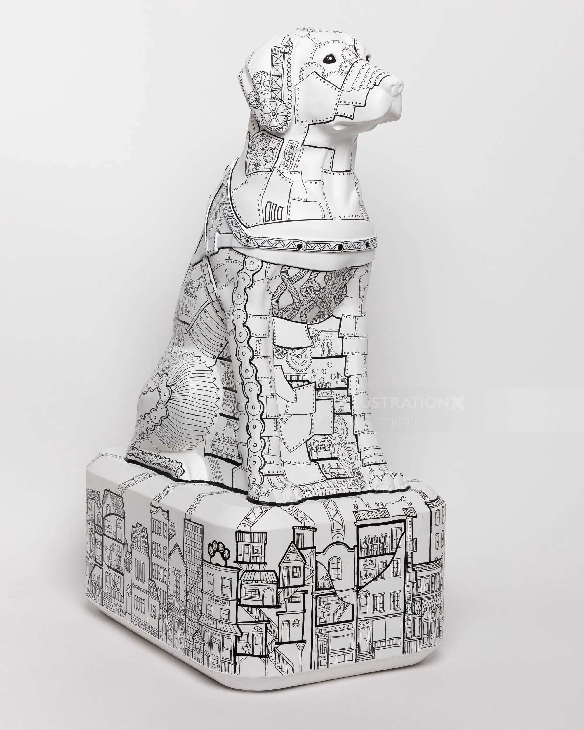 Sculpture de chien géométrique détaillée en noir et blanc sur piédestal