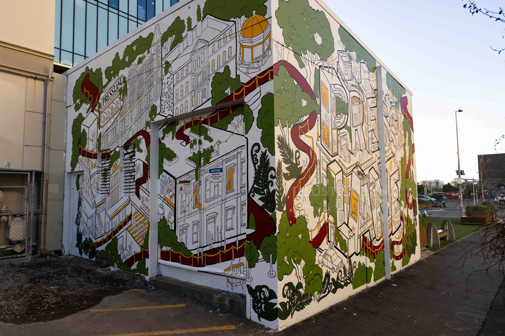 Fresque d'histoire architecturale réalisée par Ellie Compton recouvrant deux murs d'une ruelle
