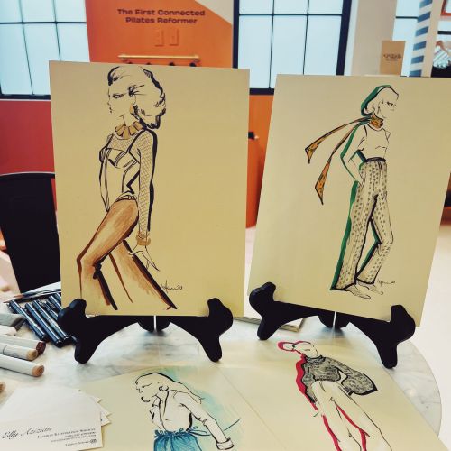 Fashion illustration sketches by Elly Azizian with models in different outfits