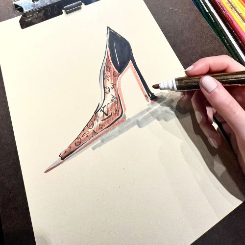 Hand drawing a high heel shoe fashion illustration with colored pencils by Elly Azizian