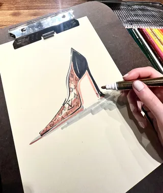 Hand drawing a high heel shoe fashion illustration with colored pencils by Elly Azizian