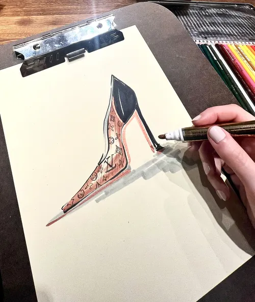 Hand drawing a high heel shoe fashion illustration with colored pencils by Elly Azizian