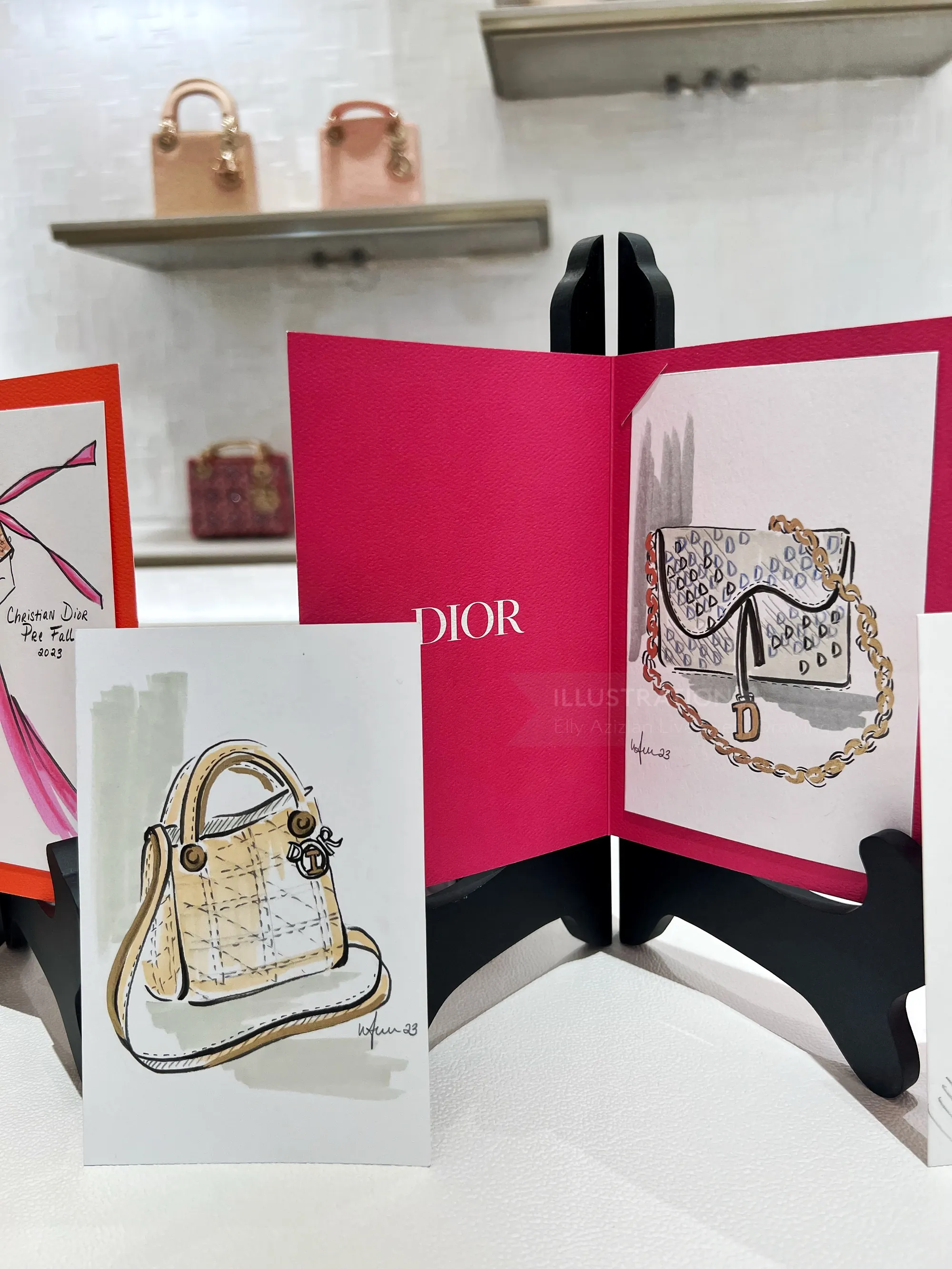 Fashion sketches of designer handbags by Elly Azizian