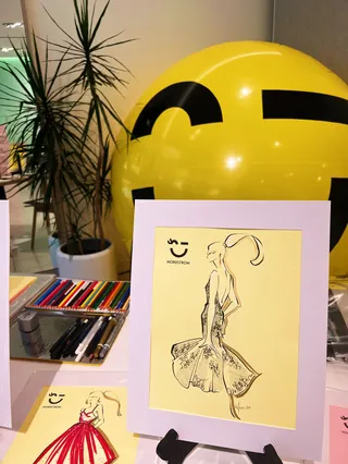 Fashion sketch with colored pencils and yellow smiley balloon by Elly Azizian