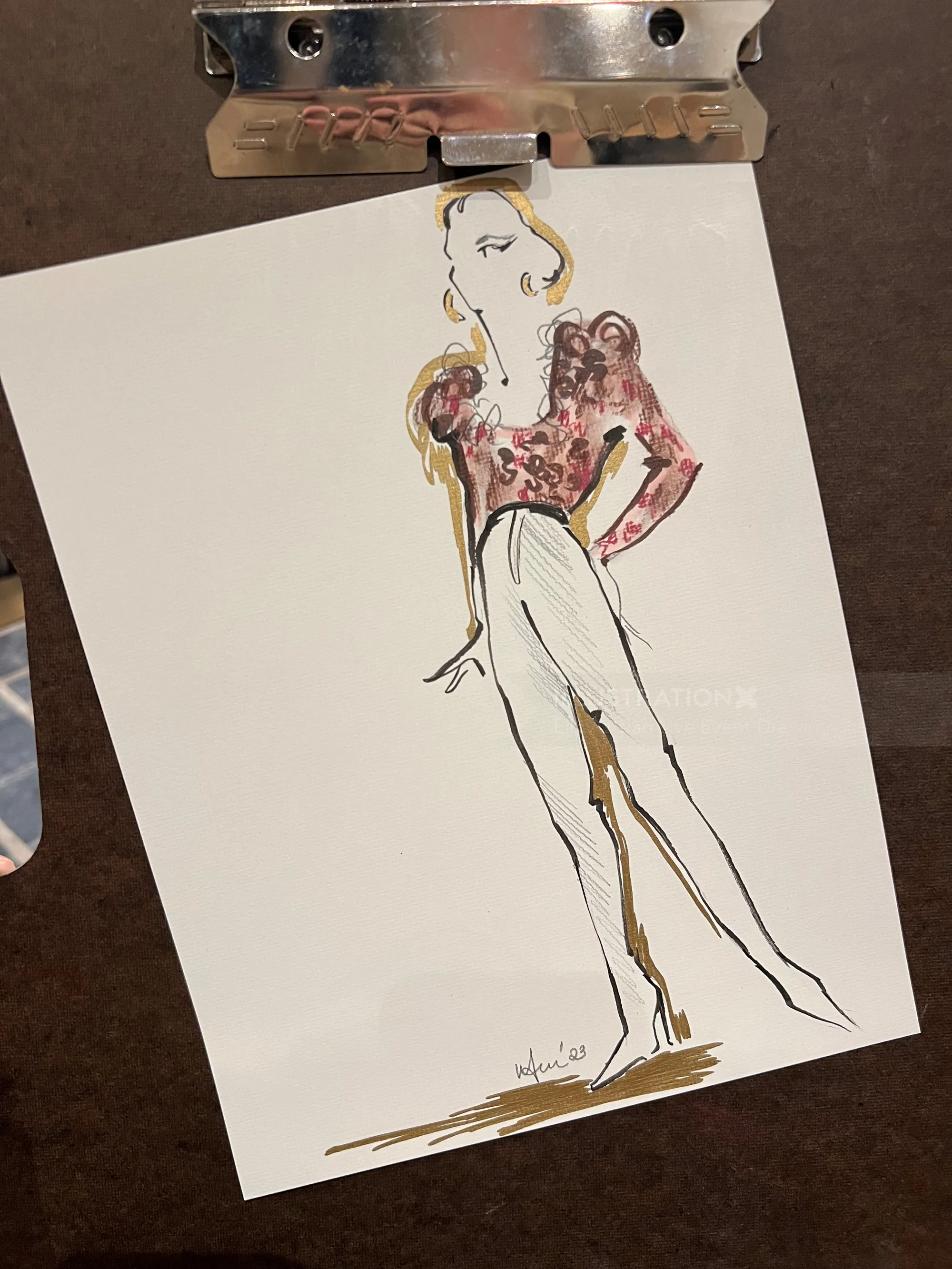 Fashion sketch of woman wearing high-waisted pants and puffed sleeve top