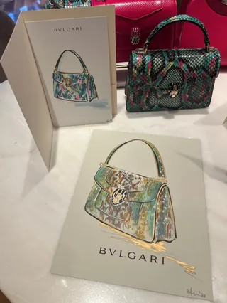 Bvlgari handbags with colorful designs and promotional cards