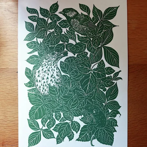 Lino cut of song thrush, great tit, and mouse in leafy hedgerow by Emily Robertson
