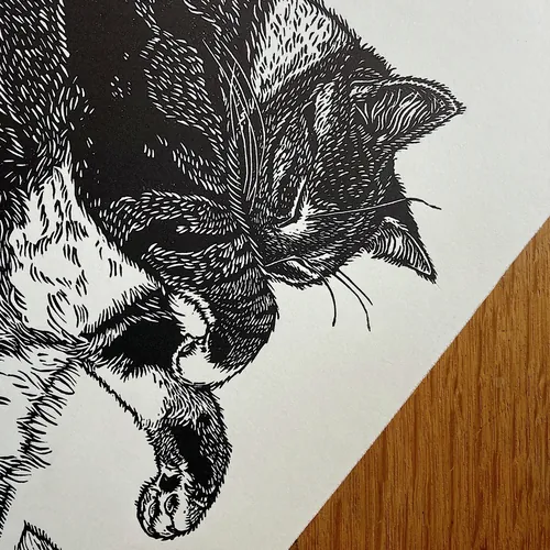 Close-up of black cat lino cut print by Emily Robertson