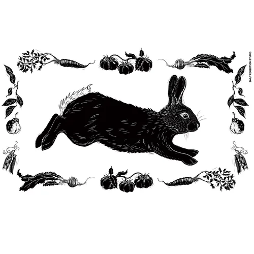 Black rabbit surrounded by vegetables on tea towel by Emily Robertson