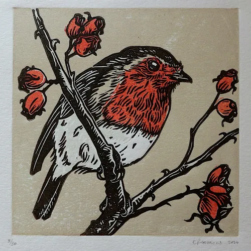 Emily Robertson linocut print of a robin perched among rose hips