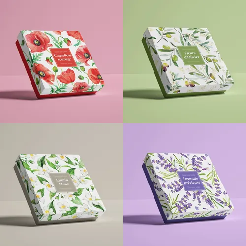 Four floral-themed souvenir boxes with Provence-inspired designs