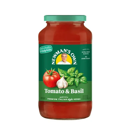 Jar of Newman's Own Tomato & Basil pasta sauce with label showing tomato, garlic, basil