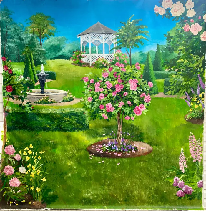 Garden with white gazebo, fountain, and blooming pink flowers by Esther Stimphat