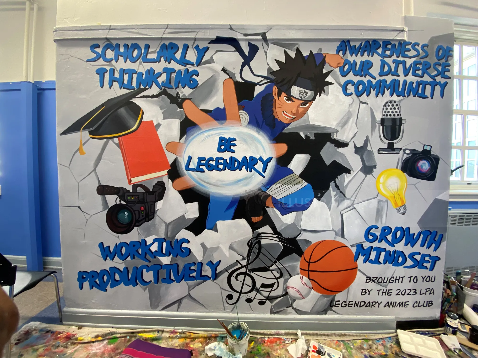 Colorful mural featuring themes of scholarship, diversity, productivity, and growth mindset