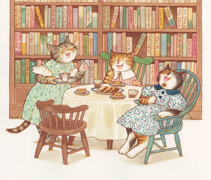 Three cats drinking tea and eating pastries in a library