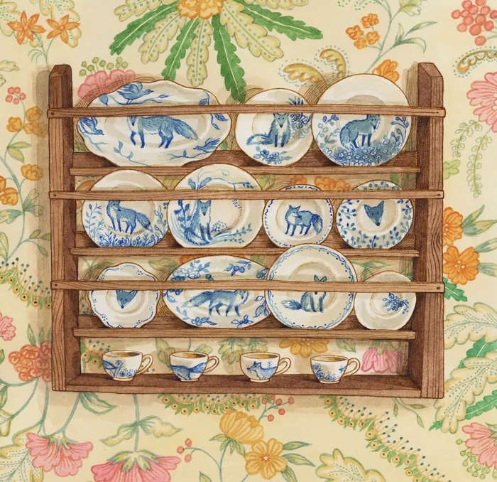 Wooden rack with blue and white plates and matching cups on floral wallpaper