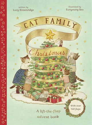 Book cover with cats decorating a Christmas tree for Cat Family Christmas
