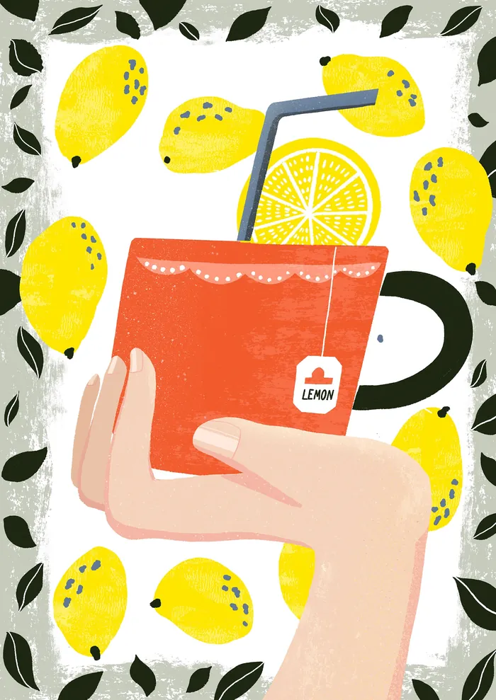 Hand holding red cup with lemon tea and lemon slice with straw