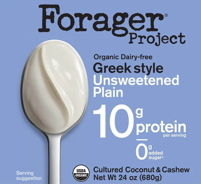 Spoonful of plain unsweetened Greek style organic yogurt