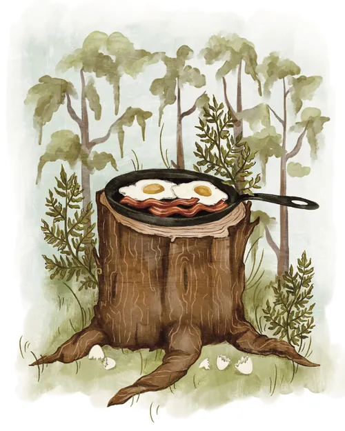 Fried eggs and bacon in skillet on tree stump, forest background by Fox and Fables