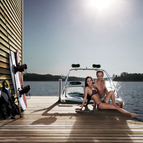 Couple sitting at beach deck
