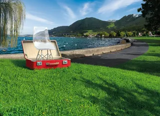 Glass chair in suitcase
