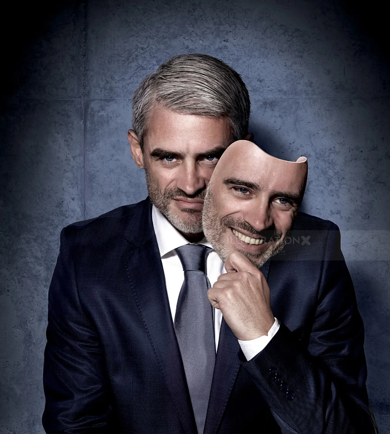 Man in suit holding a smiling face mask, artwork by Frank Neidhardt